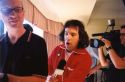 Dave grabbing and ripping up Nardwuar's interview questions. (As you can see in this photo, Dave had already chucked Nardwuar's hat and glasses across the room by this point)
