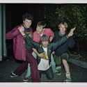 Nardwuar outside the Capitol Theatre, Olympia , Washington, USA  at Yo-Yo-A-Go-Go 1997 with Jared (Karp), Chad Q (Black Booking) and Scott (Evaporators, Thee Goblins) . (Pic: Scott Livingstone)