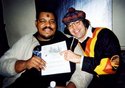 Nardwuar showing Wesley Willis a print out from the Wesley Willis Church Webpage. This is no joke! A real Wesley Willis Church exists in Clinton, Ontario, Canada!  Check out it out: http://wwuc.clinton.on.ca/index.html  