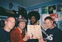 Nardwuar and the kind crew at Beat Street records in Vancouver with ?uestlove of the Roots, pointing to a picture of a very young Jay-z on the back of a JAZ Record.  Robson Street, Vancouver, BC, Canada!