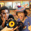Benjamin Booker Band, Nardwuar.  Ben is looking at Jackie Shane's 1963 "Any Other Way" Single on Sue Records which I gave him as a "Welcome" to VanCity gift .Doot doo !  