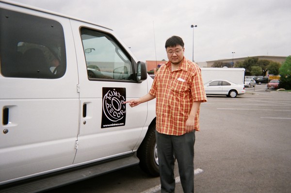 Mint Records Randy Iwata beside the 'custom' Mint Van!
