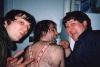 Chris and Jess examining Nardwuar's back hair for dandruff 