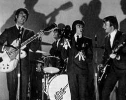 The Monkees on stage